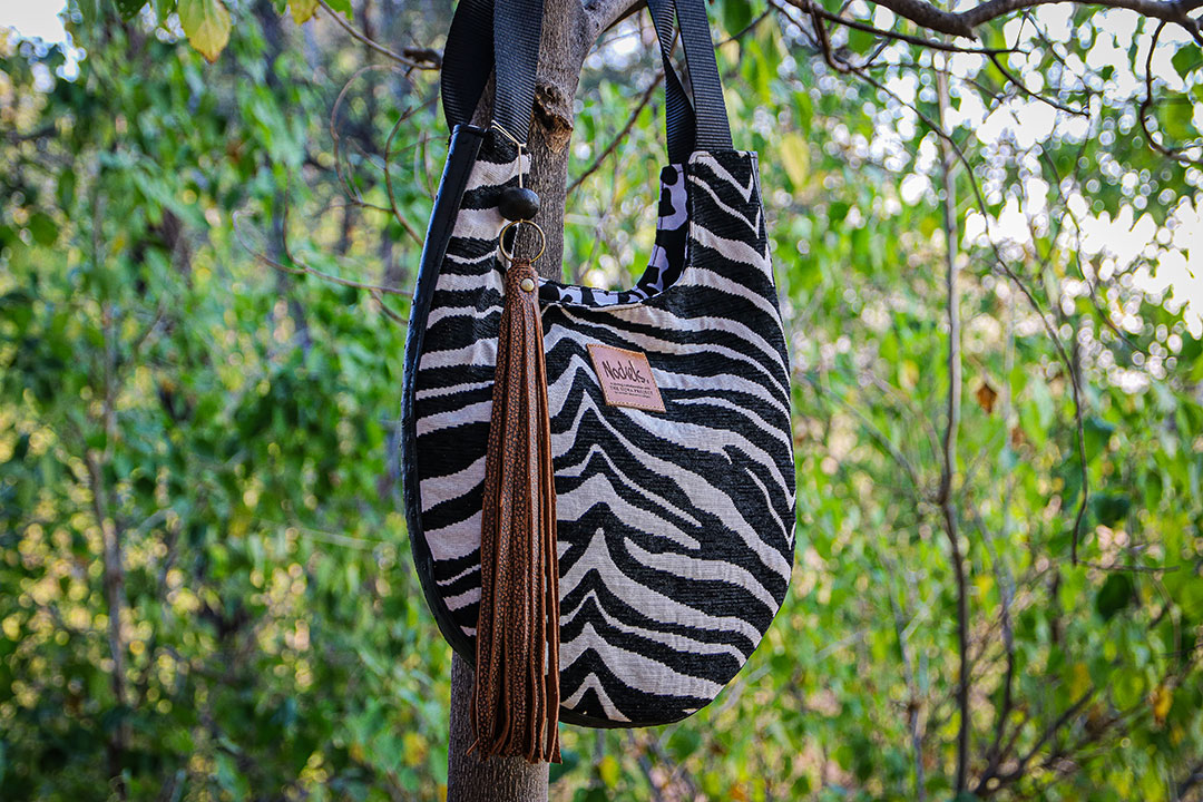 African Monarch Lodges Sijwa Nockels Bag